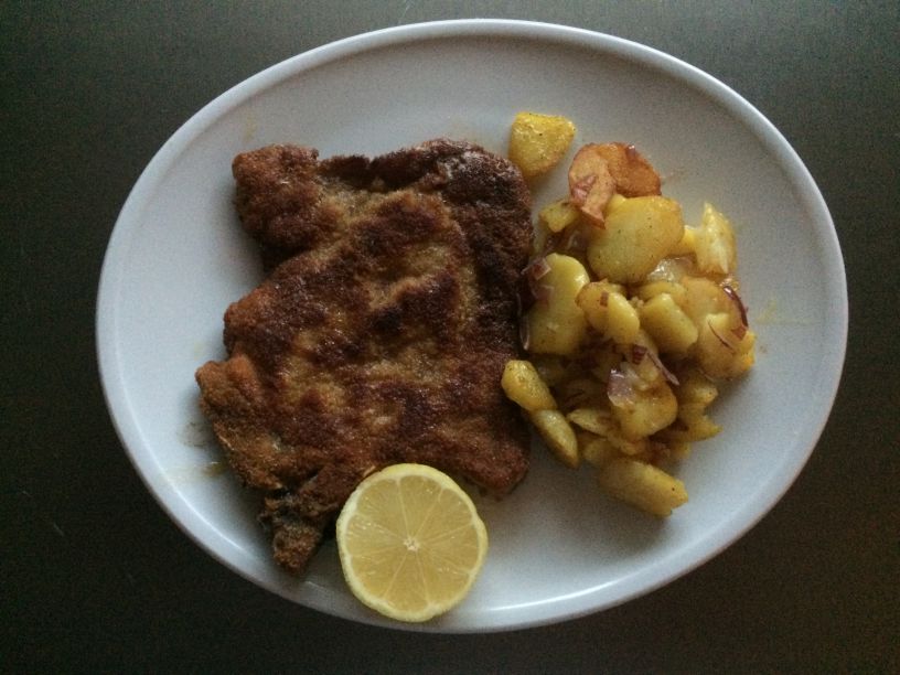 Teller Schweine Kotelett mit Bratkartoffeln